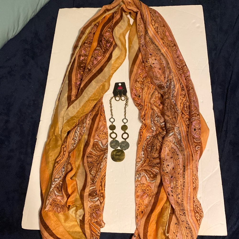 2 scarfs and a Paparazzi necklace and earrings set. Big scarf is about 69” long